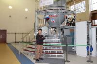 Photo near Simulator Soyuz TMA of tourist from Iran